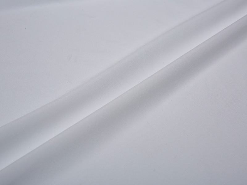 Polyesteri venyvä limakangas